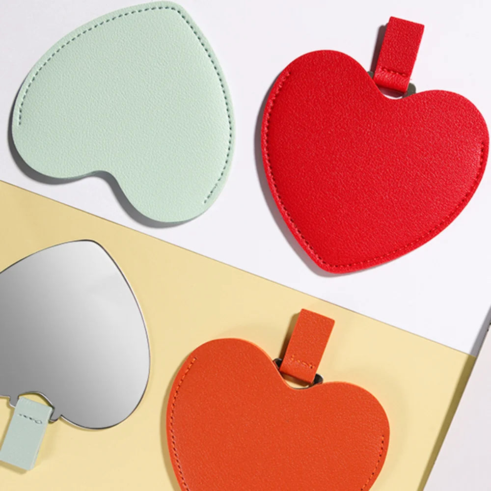 CX503  Love Heart Shaped Makeup Mirror Stainless Steel Ultra-thin Cosmetic Mirrors Mini Potable Pocket Mirror with PU Leather Bag