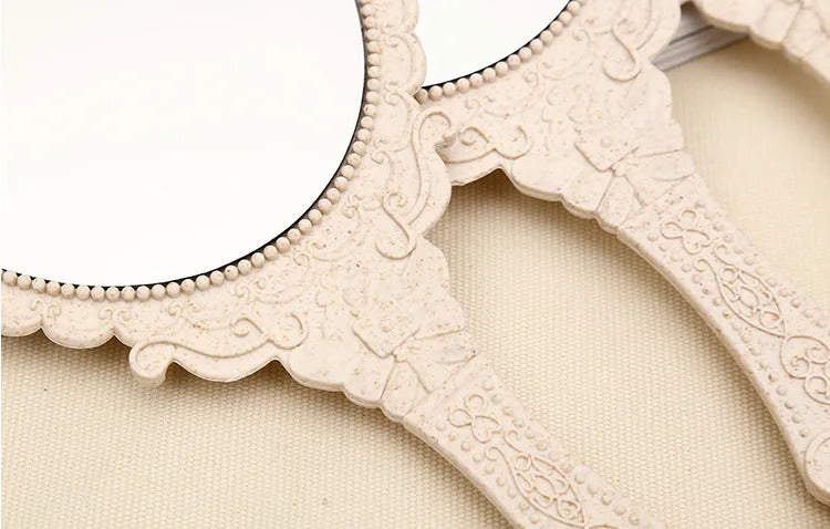 L518 New hand-held mirror HD handle make-up mirror Korean retro pattern beauty mirror European portable mirror princess